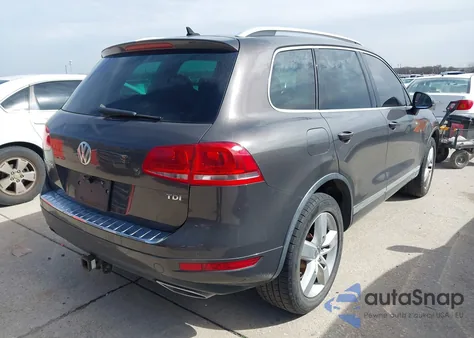 2012 Volkswagen Touareg Tdi Lux z USA, uszkodzony, nr VIN WVGFK9BP7CD002548